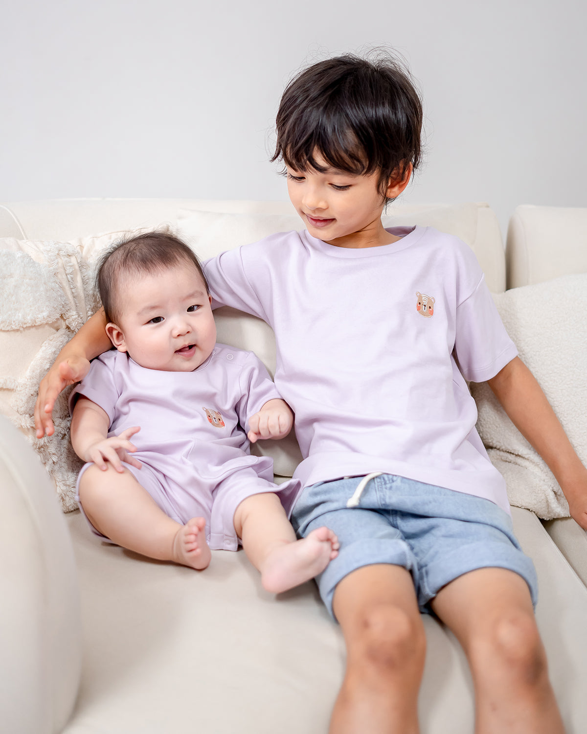 LEBEAR SIGNATURE EMBROIDERY ONESIE IN LILAC