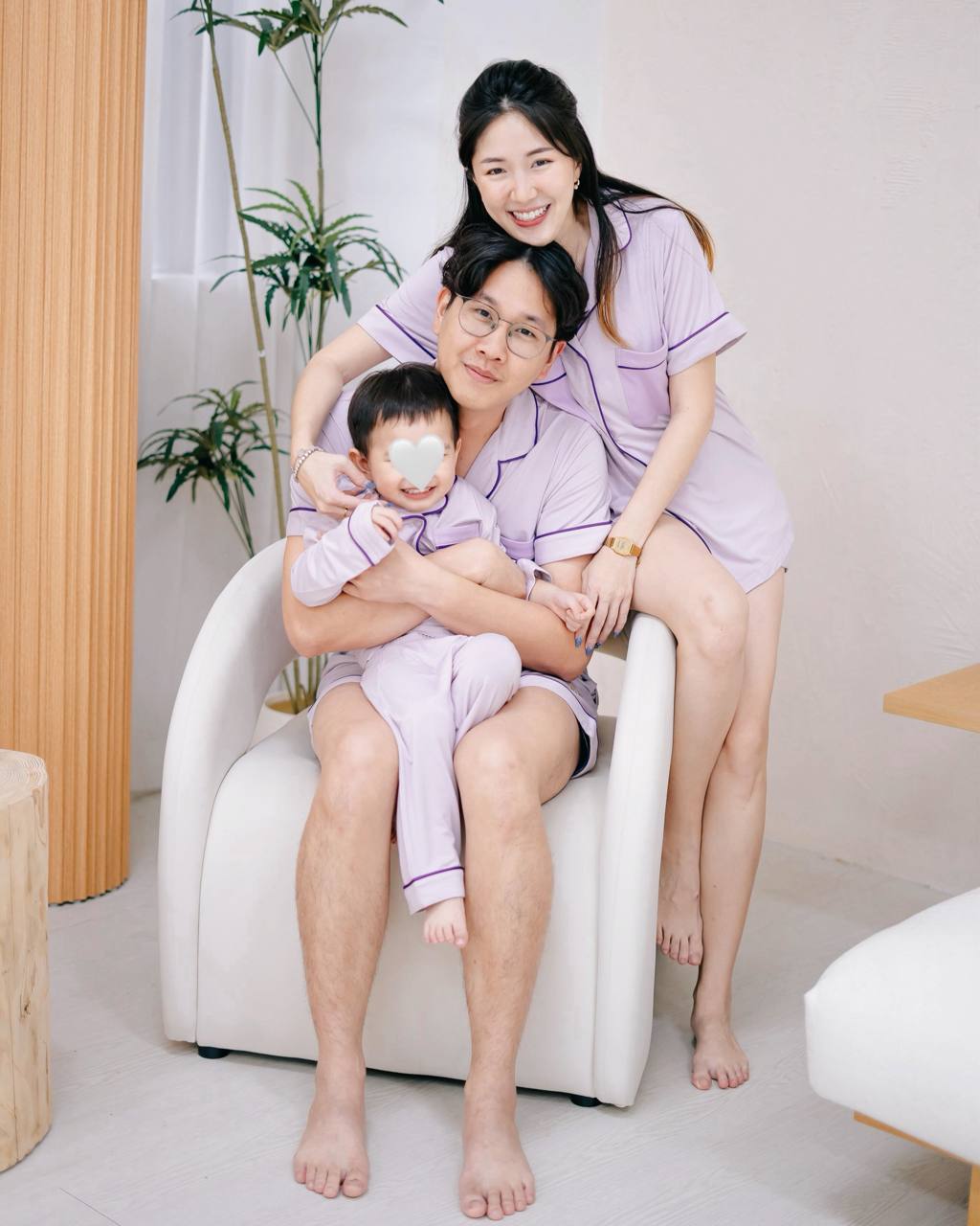 Family wearing LeBear × Em Obsessed OEKO-TEX® bamboo lavender family matching pyjamas in a bright modern home