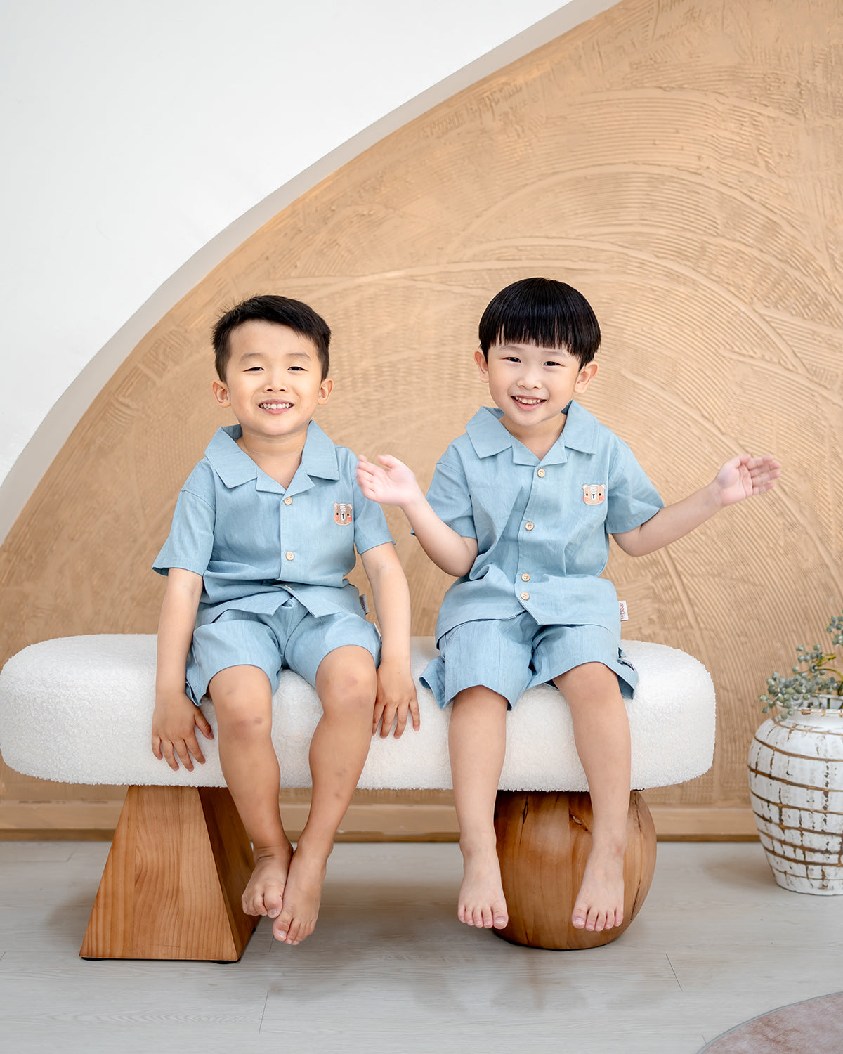 Two boys wearing LeBear Liam Denim Camp Collar Set made from 100% premium cotton with bear embroidery