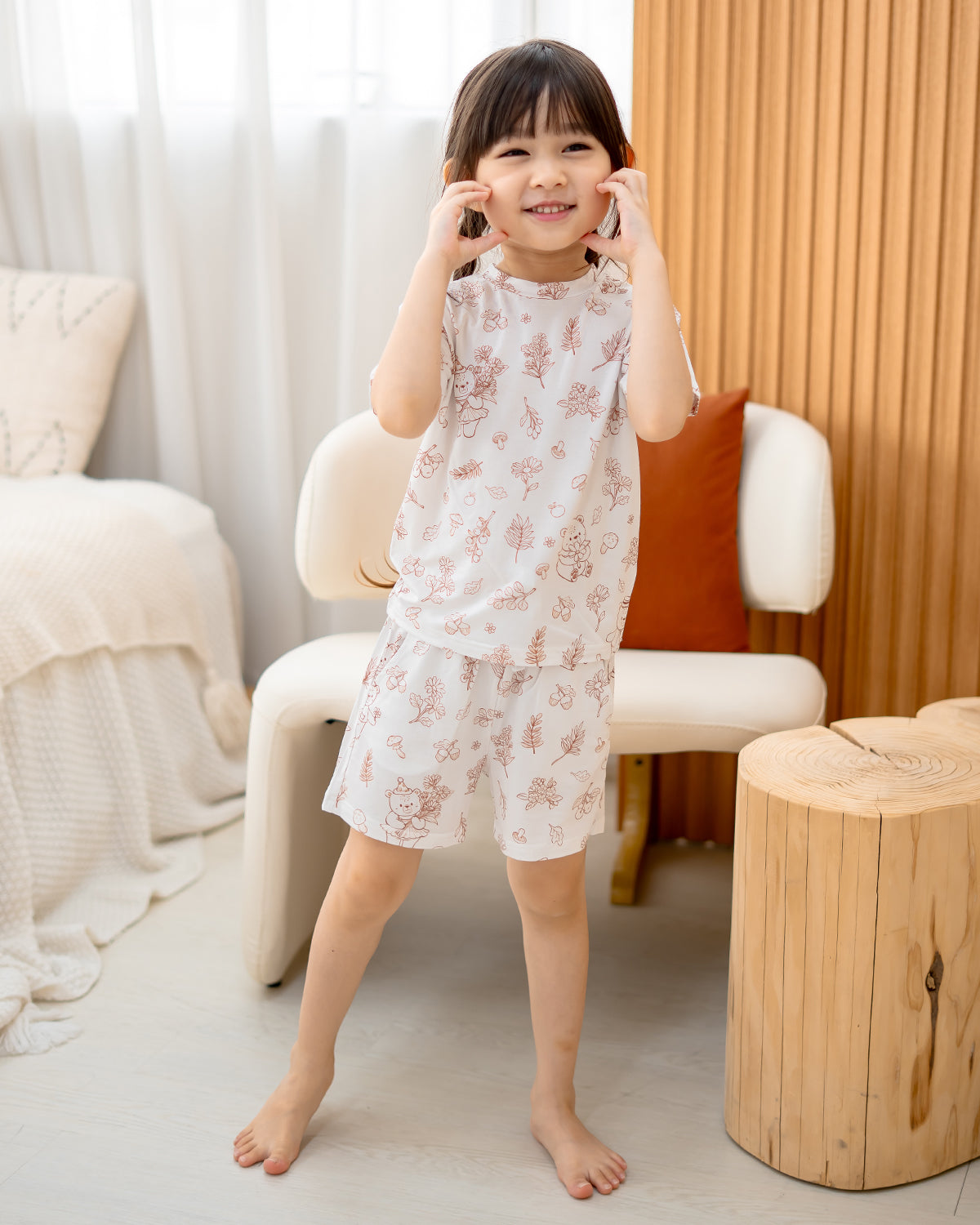 Full body view of child in LeBear Meadow Mocha TENCEL kids set