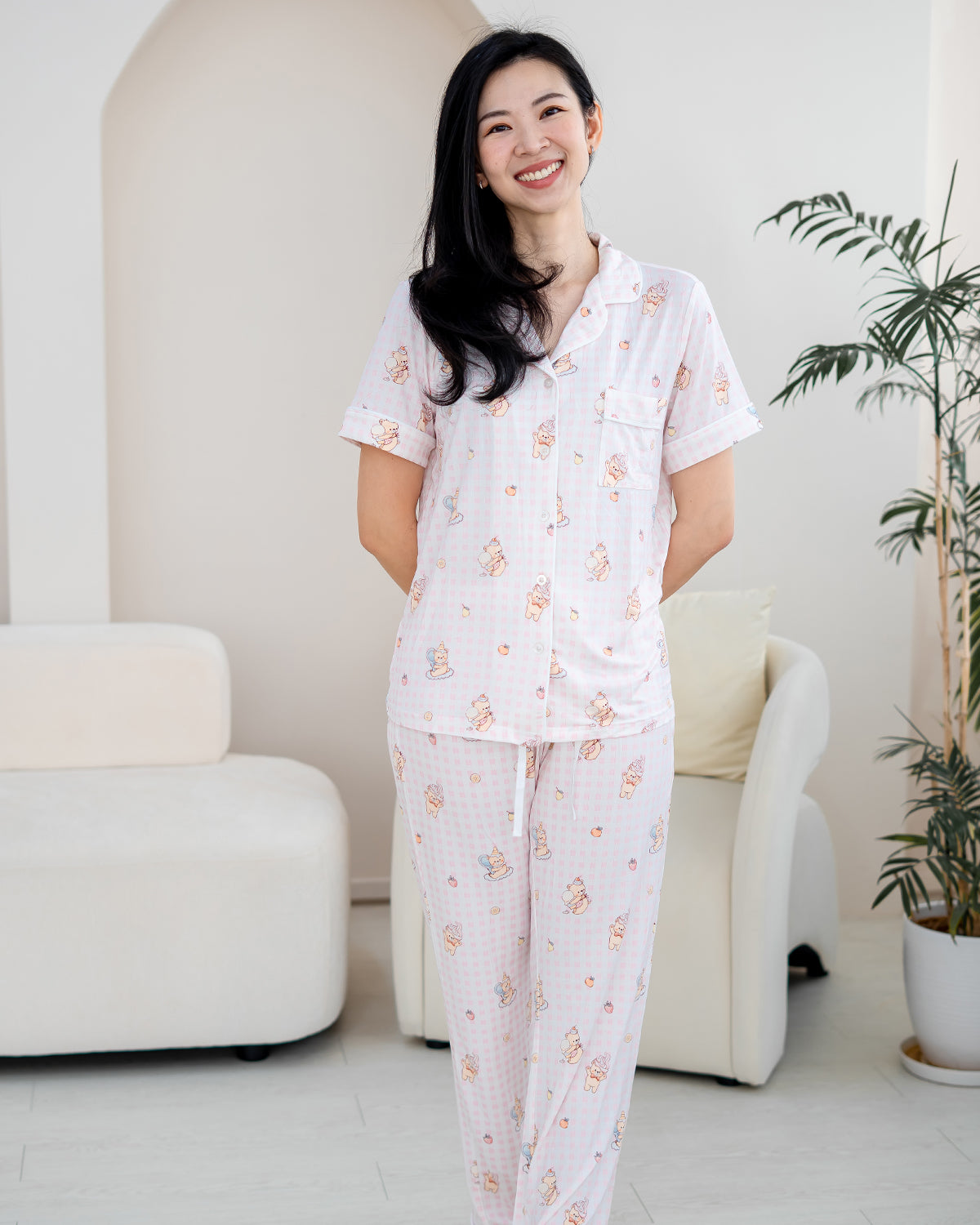 Front view of LeBear Sweet Scoop bamboo pyjama set featuring a relaxed fit, pink gingham design and playful dessert-inspired print.
