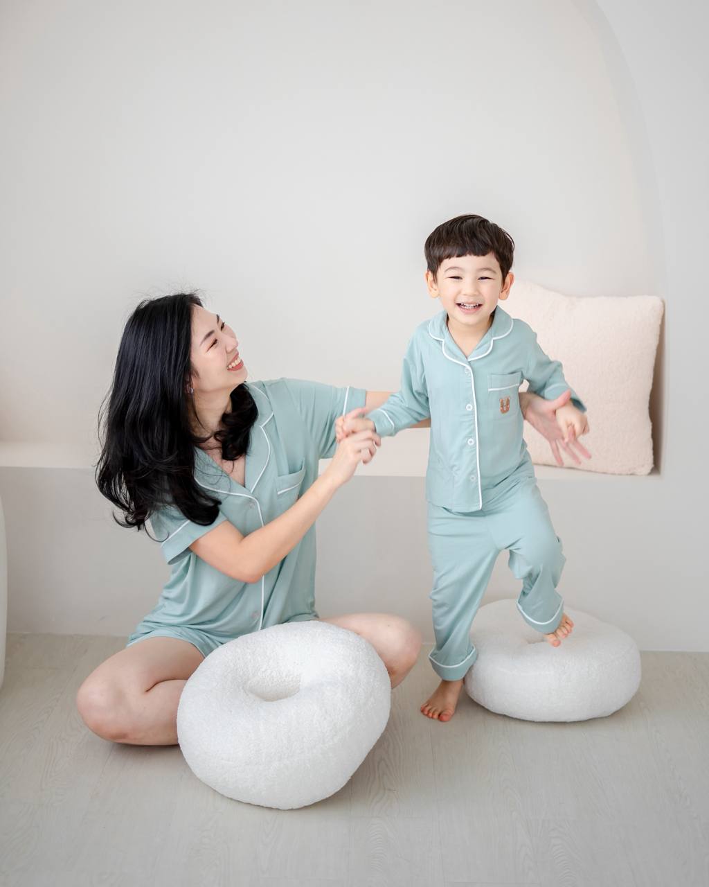 Matching LeBear bamboo pyjamas in Tiffany Green for mother and child