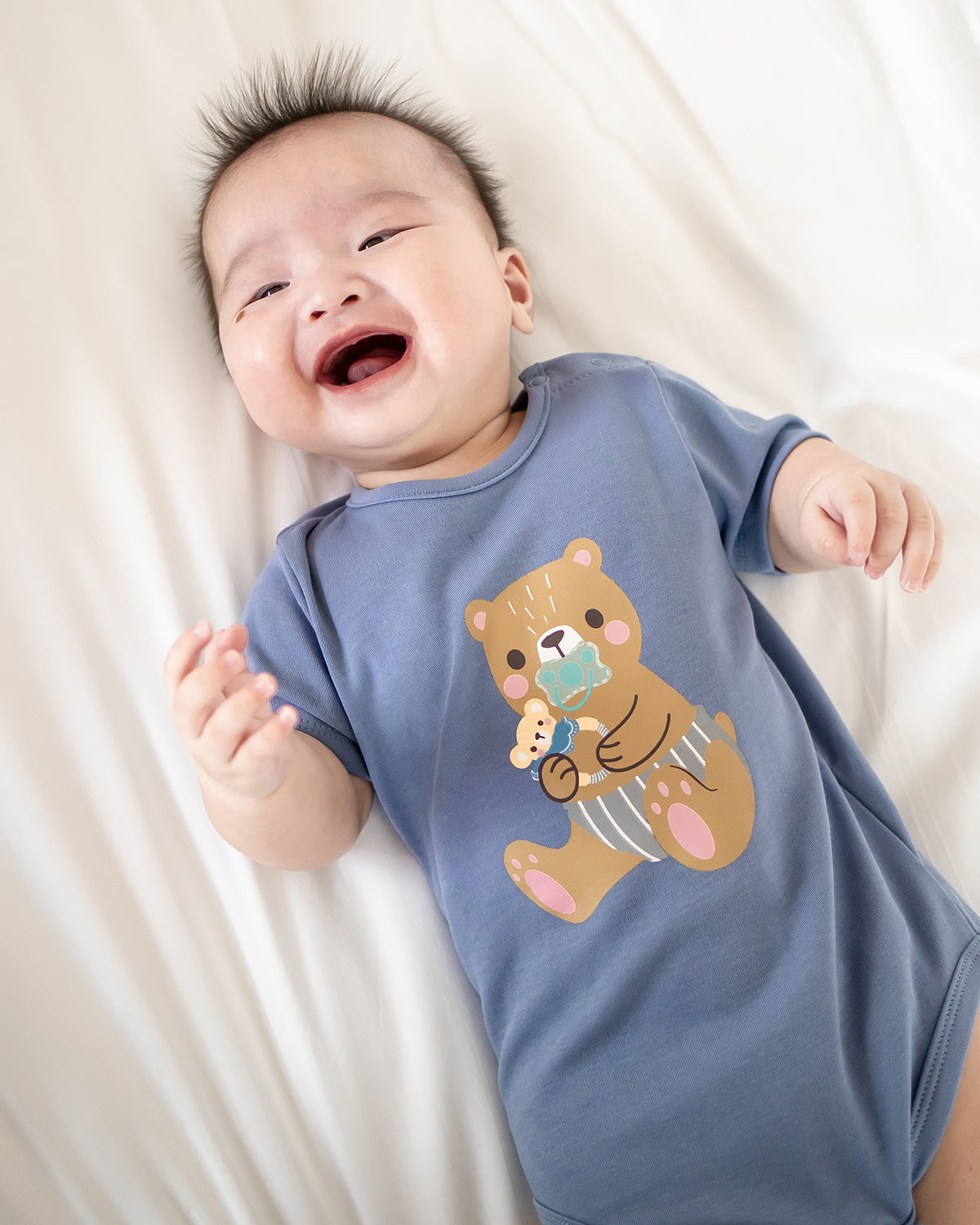 NM X LEBEAR BINKY BEAR ONESIE IN YALE BLUE