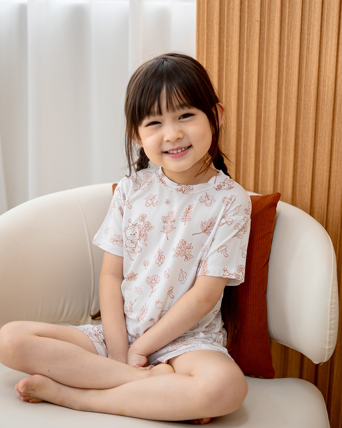 Close-up of child in LeBear Meadow Mocha TENCEL kids set