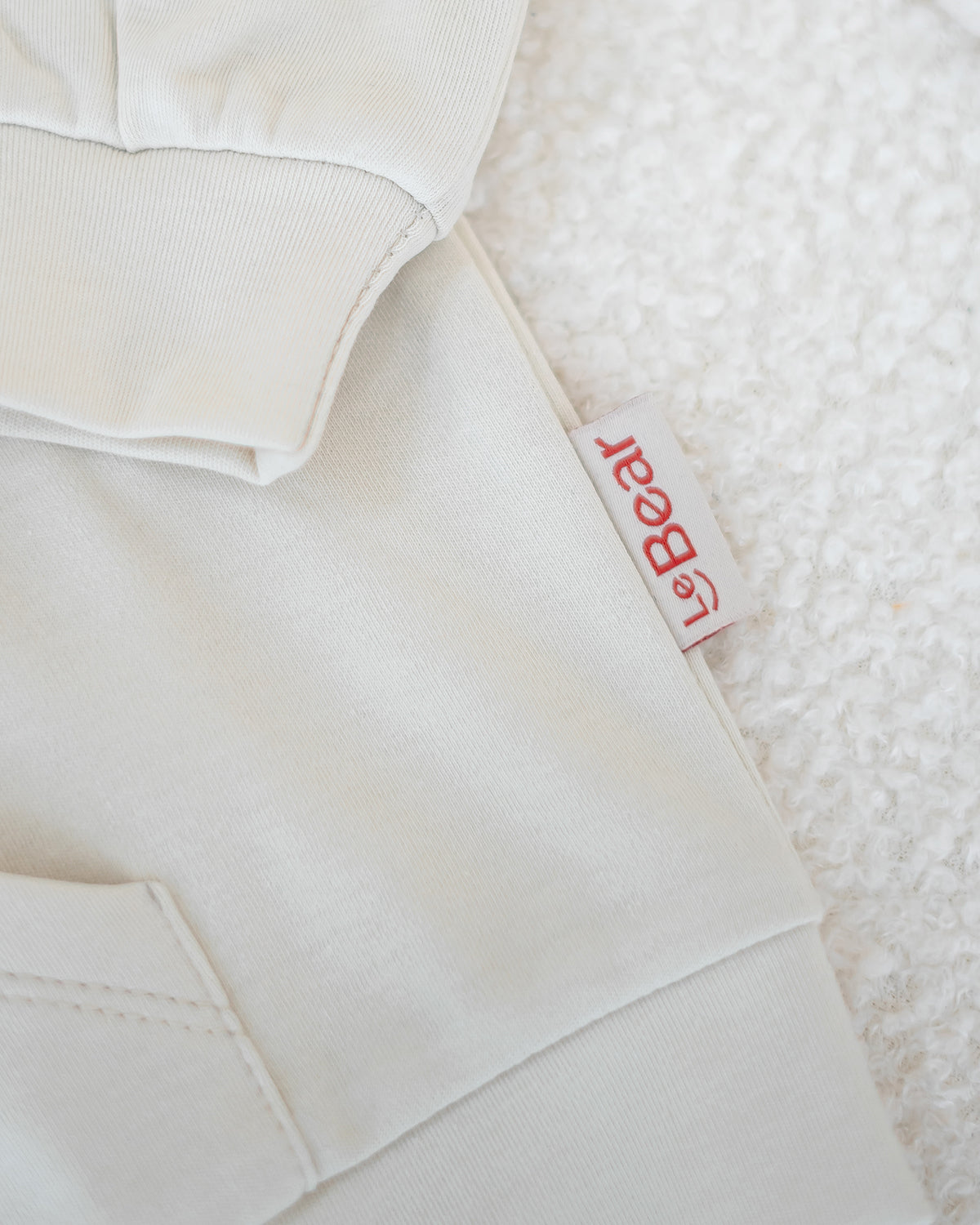 VOYABEAR HOODED JACKET IN SAND BEIGE