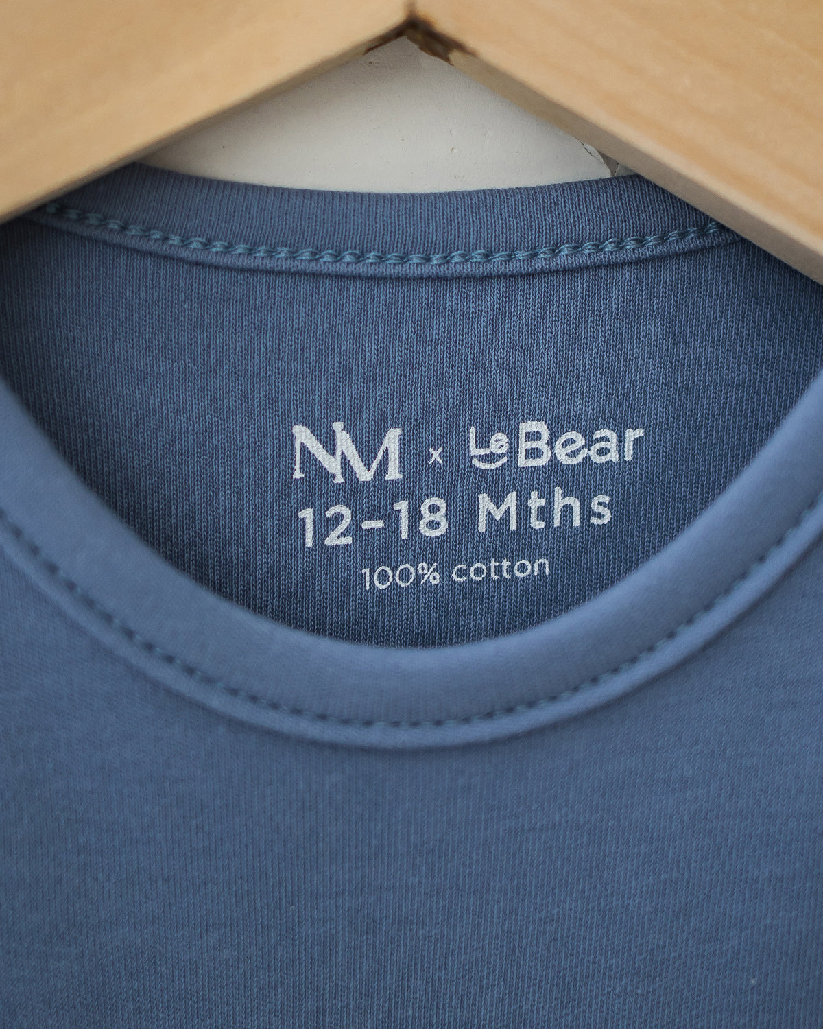 NM X LEBEAR BINKY BEAR ONESIE IN YALE BLUE