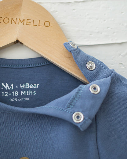 NM X LEBEAR BINKY BEAR ONESIE IN YALE BLUE