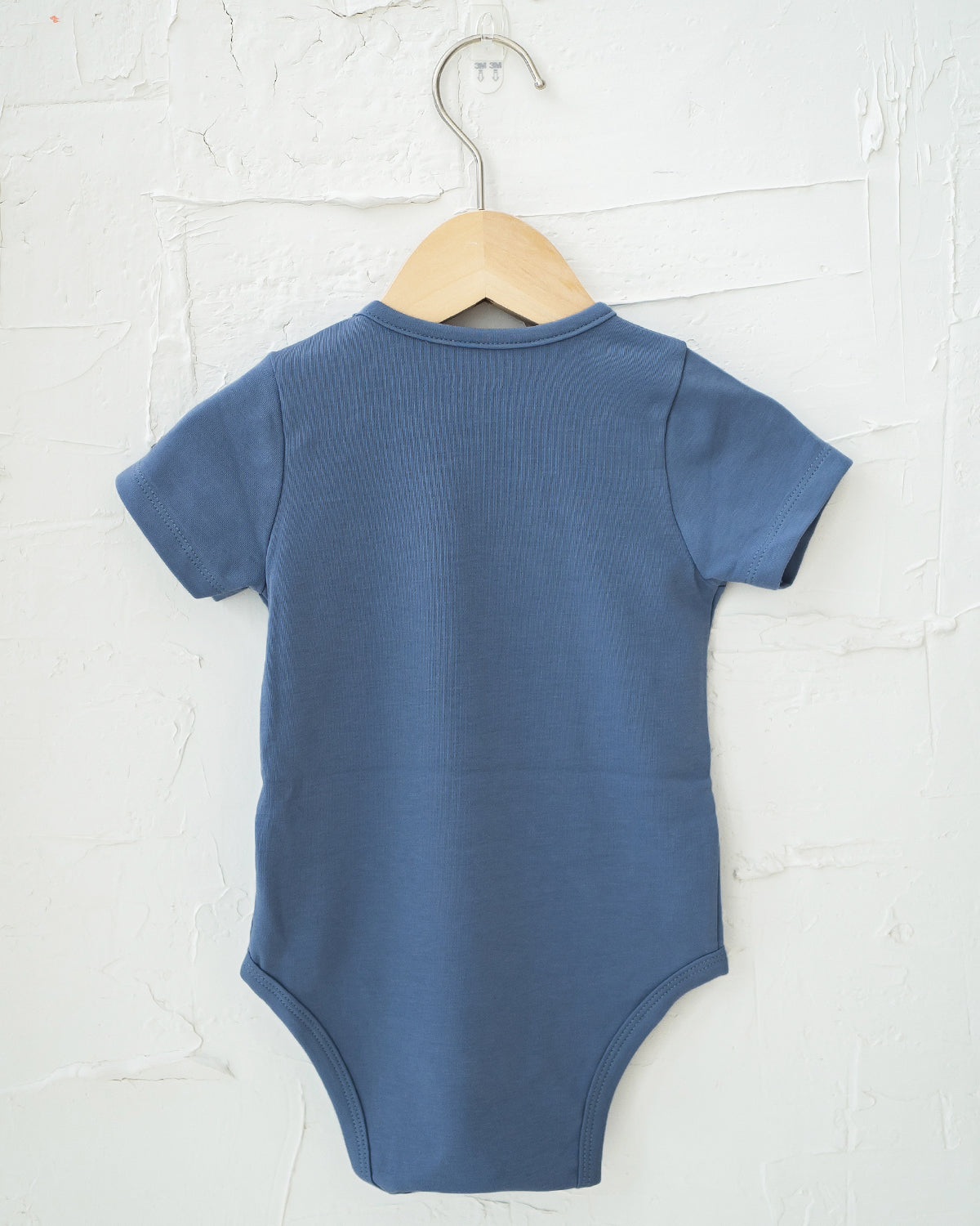 NM X LEBEAR BINKY BEAR ONESIE IN YALE BLUE