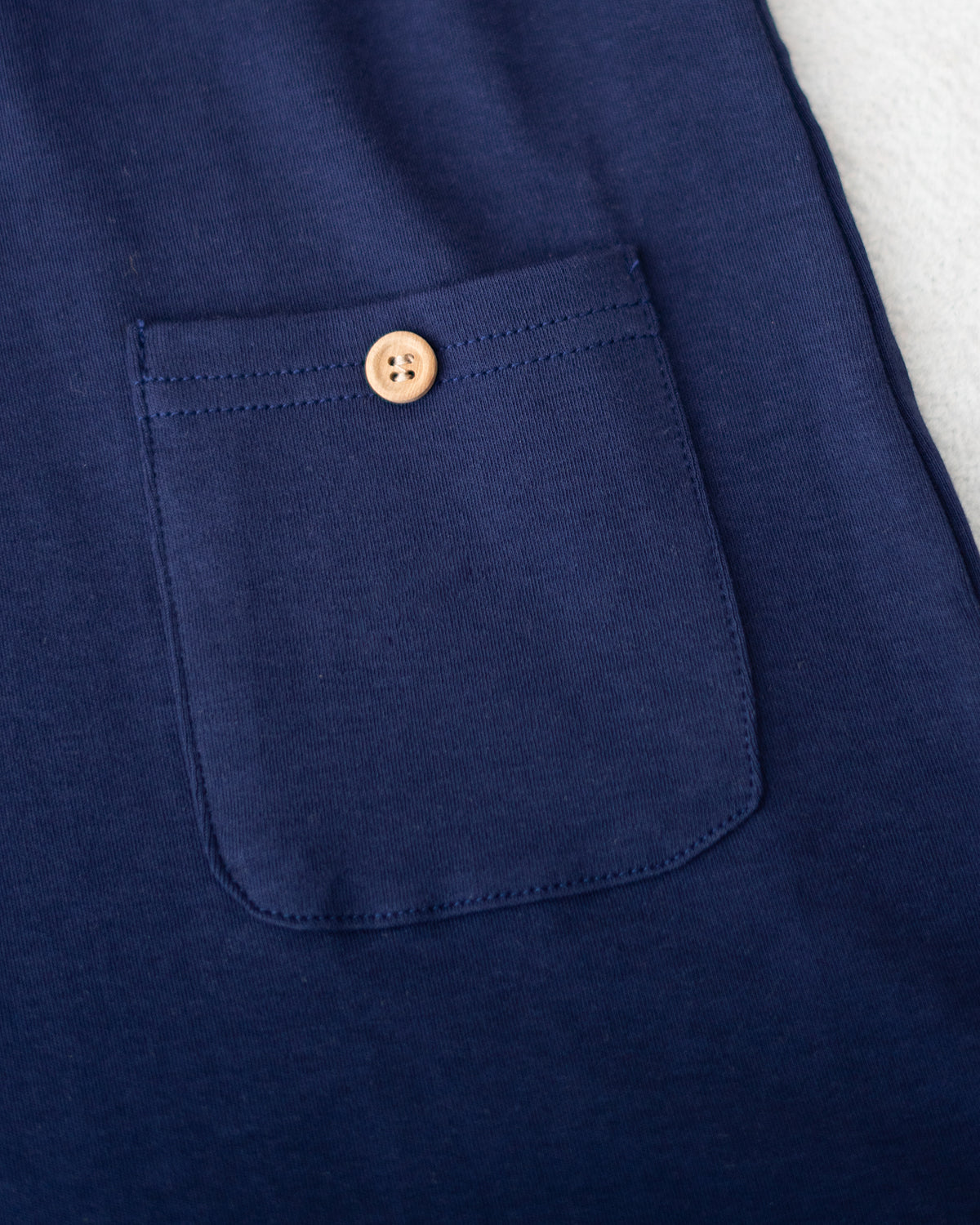 LEBEAR SIGNATURE EMBROIDERY ONESIE IN DEEP SEA NAVY