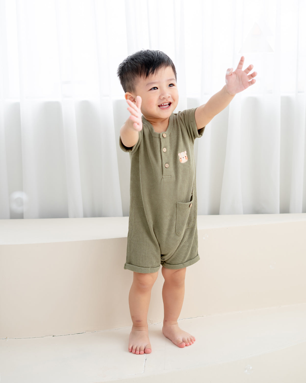 HELLO WAFFLE ONESIE IN OLIVE GREEN