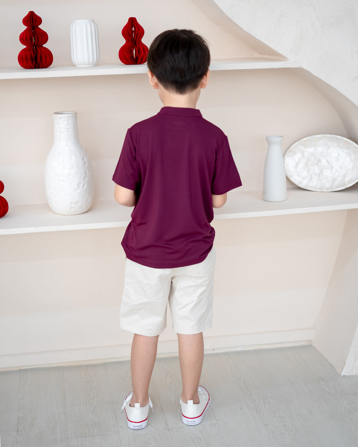 Back view of Off White Everyday Essential Shorts with LeBear label