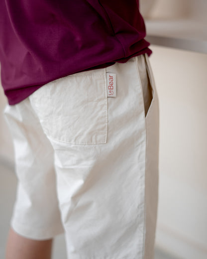 Close-up of Off White shorts pocket and waistband – kids everyday wear