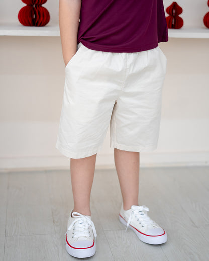 Front view of kids Off White shorts – lightweight woven fabric