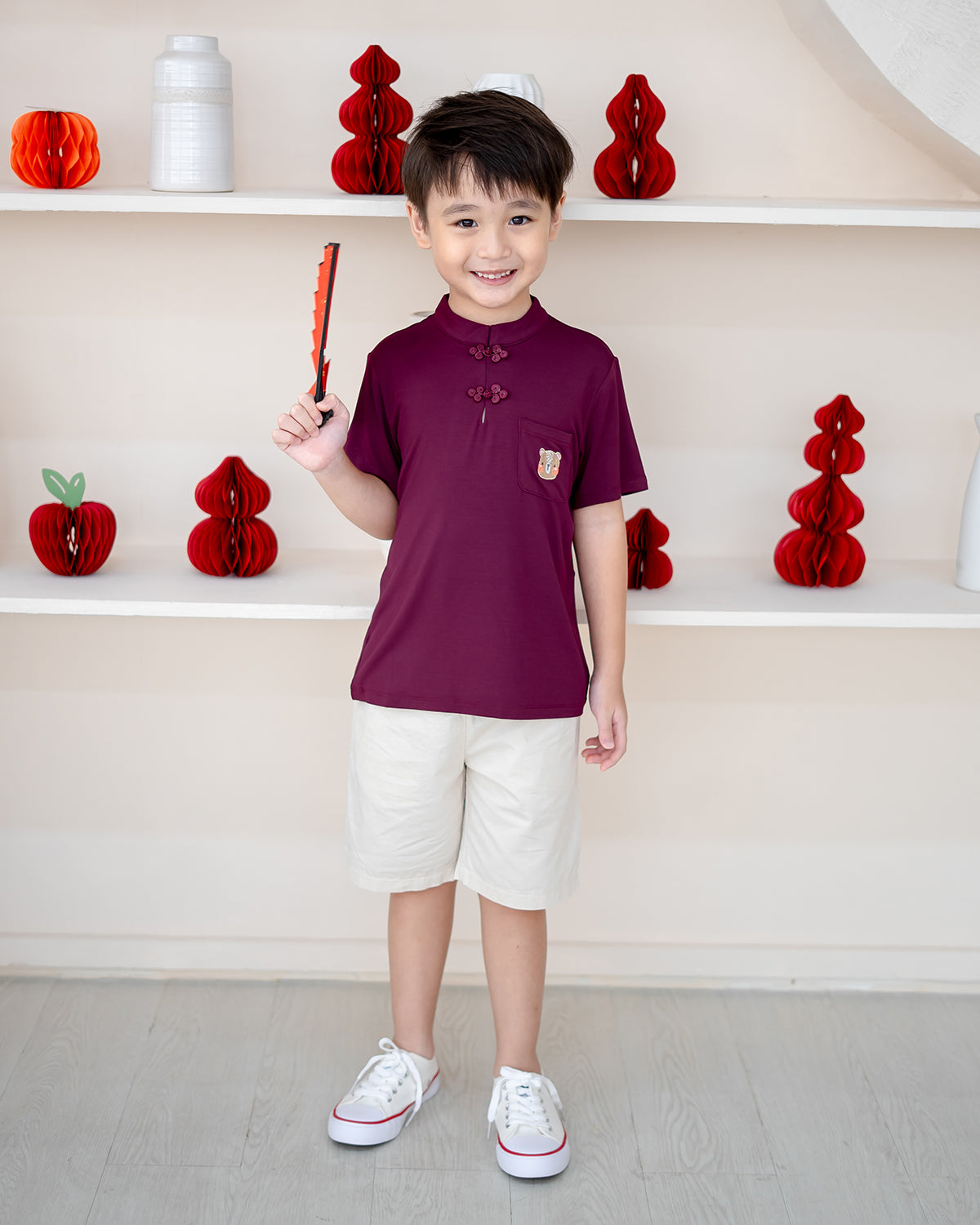Boy wearing Everyday Essential Shorts in Off White – breathable kids neutral shorts