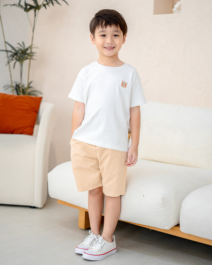 Boy in white tee and Everyday Essential Shorts in Sand Dunes – casual everyday outfit