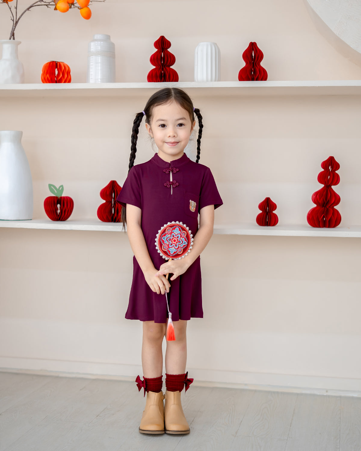 Full outfit shot of Plum Blossom Cheongsam for girls – Lunar New Year dress