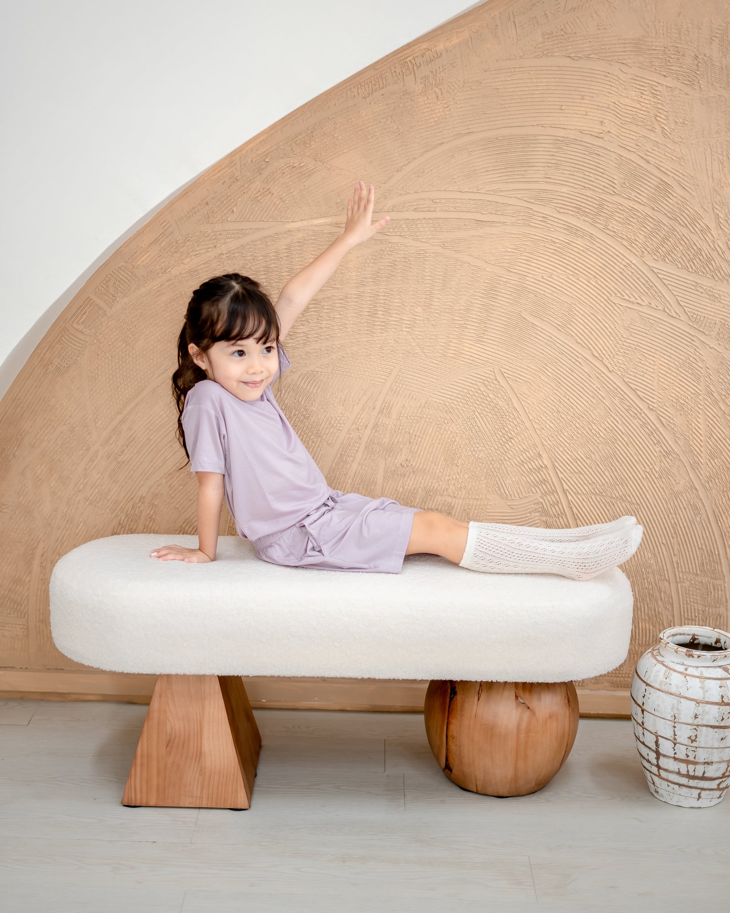 Girl in lilac loungewear made from eco-friendly OEKO-TEX® certified TENCEL™ Lyocell, lightweight and breathable