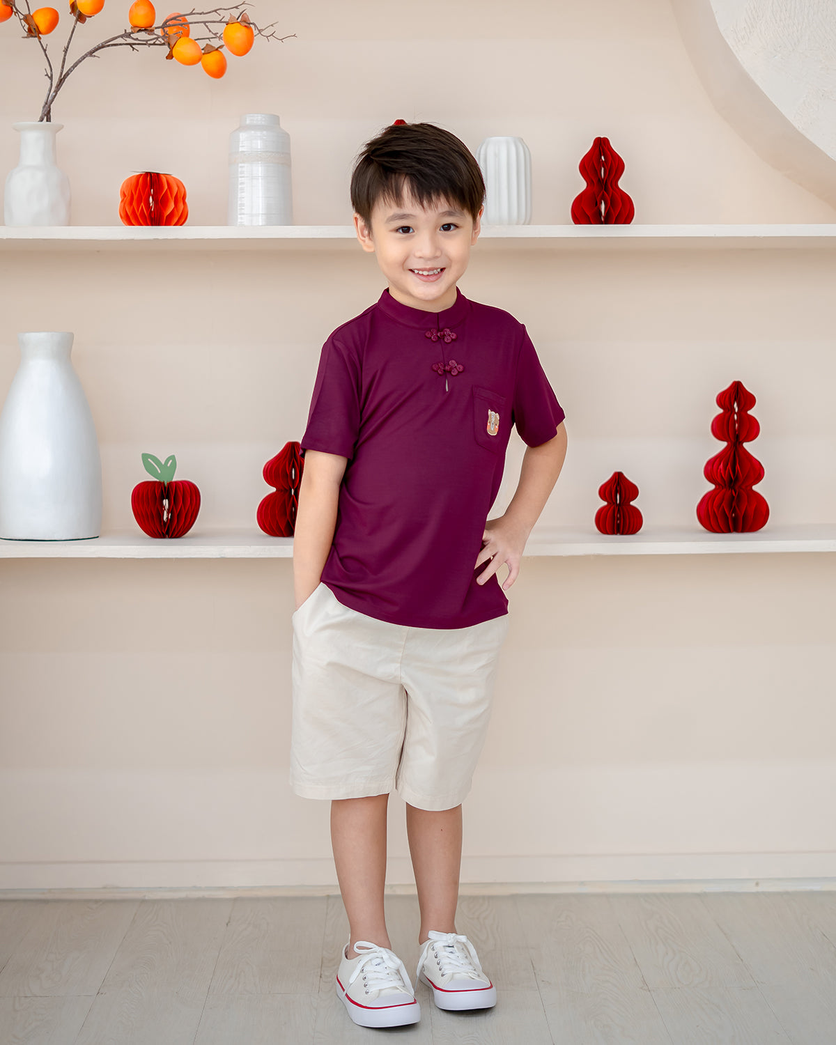 Full outfit of Plum Blossom Mandarin Set paired with off-white shorts