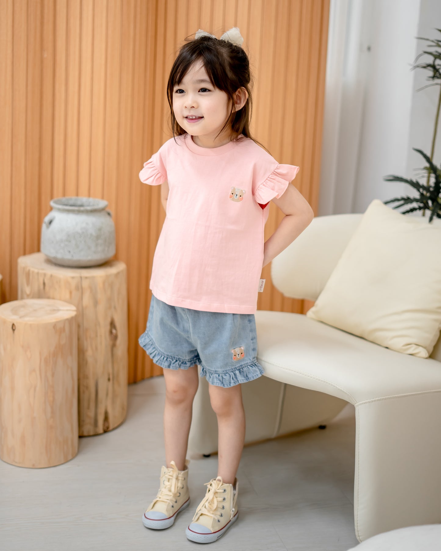 Kids pink Odell cotton tee with ruffle sleeves and denim shorts, cute and breathable outfit for girls.