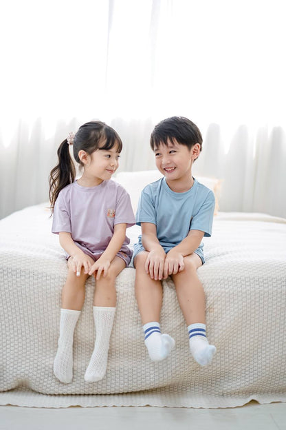 Back view of sustainable kids skyblue loungewear crafted from soft and lightweight TENCEL™ Lyocell material