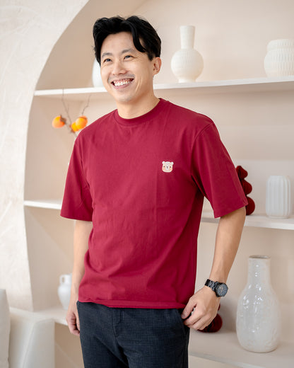 Smiling man in LEBEAR oversized red tee – breathable premium cotton CNY top