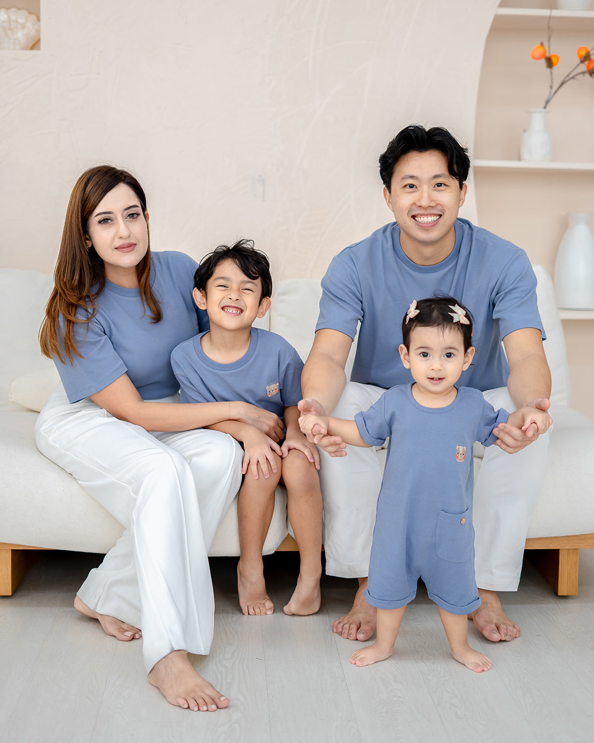 Toddler and parents in LEBEAR Steel Blue family matching tees – premium cotton apparel