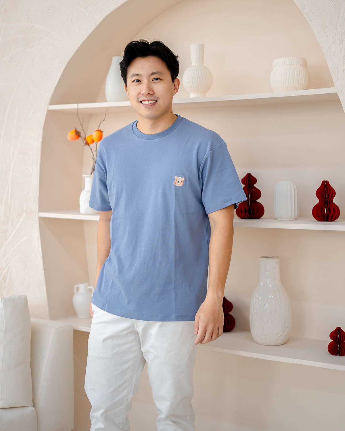 Man wearing LEBEAR Adult Signature Embroidery Tee in Steel Blue – relaxed unisex fit