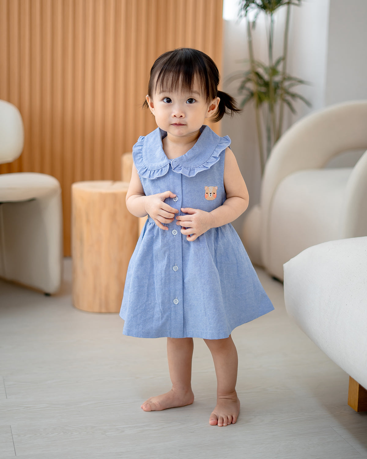 “Toddler girl in LeBear Blue Atelier Ruffle Collar Dress – soft lightweight cotton dress”