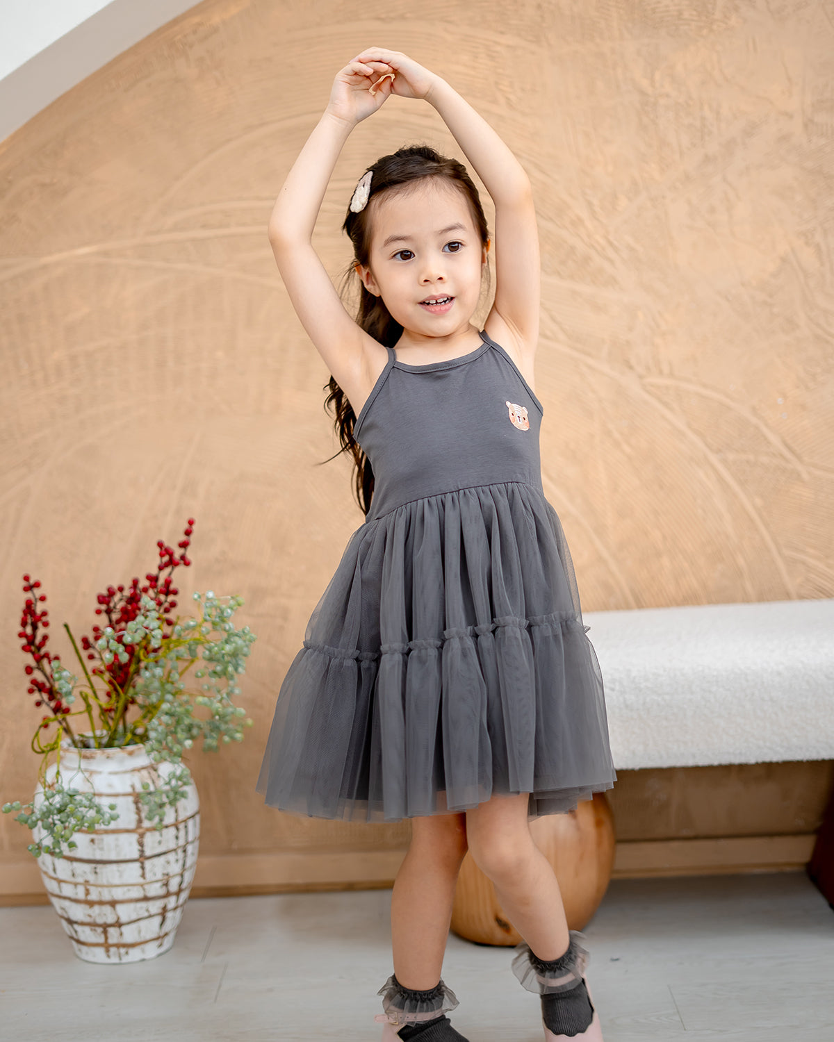 “Lifestyle photo of girl wearing LeBear Ballet Tulle Dress with soft TENCEL camisole”