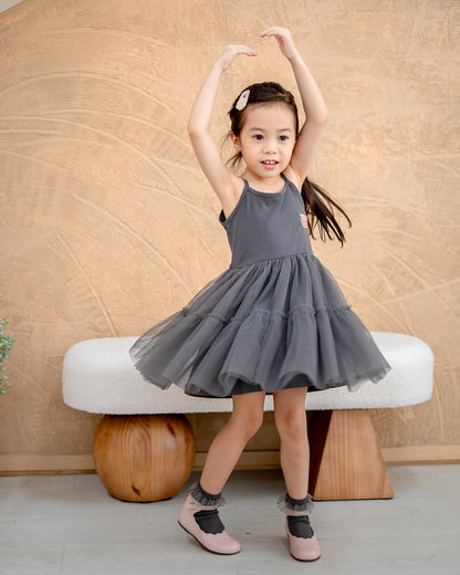 “Child twirling in LeBear TENCEL blend Ballet Tulle Dress with triple-layer skirt”