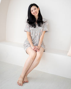 Model sitting comfortably in LeBear Bearista adult bamboo pyjamas made from buttery-soft bamboo fabric.