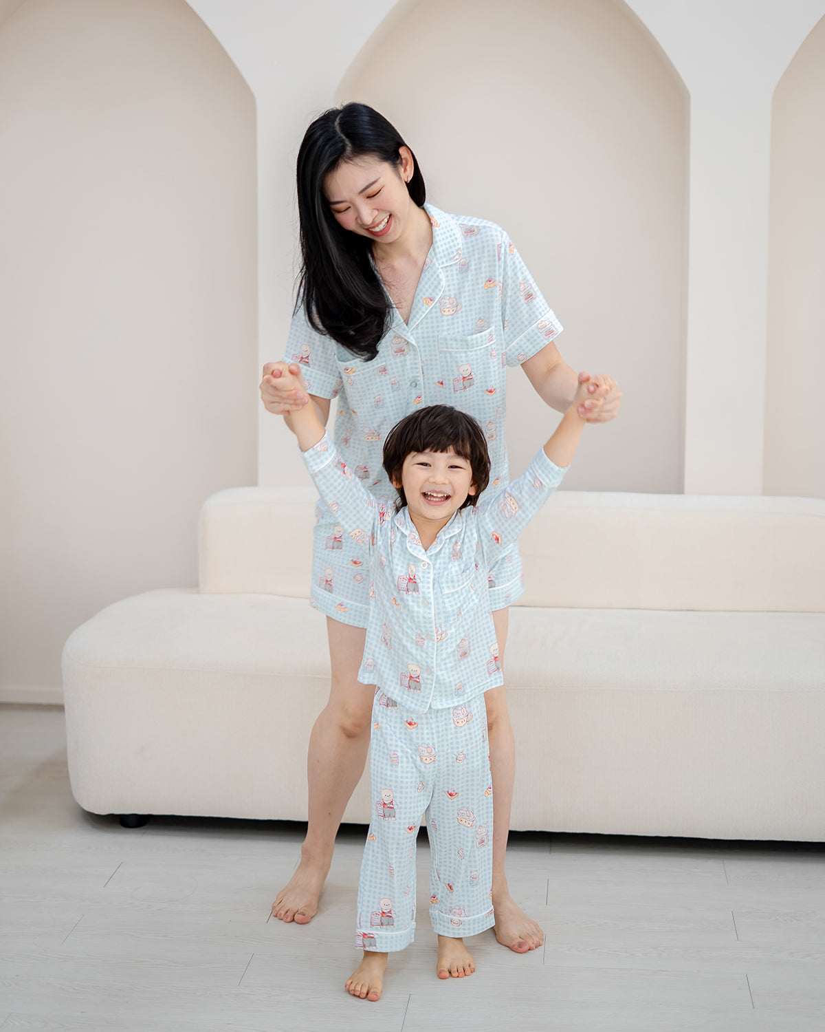 Mum and child in matching LeBear Bearista Bluebell Gingham bamboo pyjamas, perfect for family matching sleepwear.
