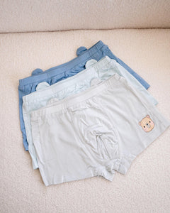 Set of three boys’ bamboo boxer briefs in soft pastel shades – includes bear mascot print on front