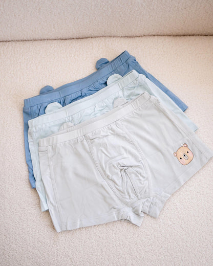 Set of three boys’ bamboo boxer briefs in soft pastel shades – includes bear mascot print on front