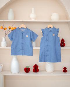 "LeBear Denim Serenity Mandarin Set and Cheongsam – matching lightweight denim kids CNY outfits on hangers"