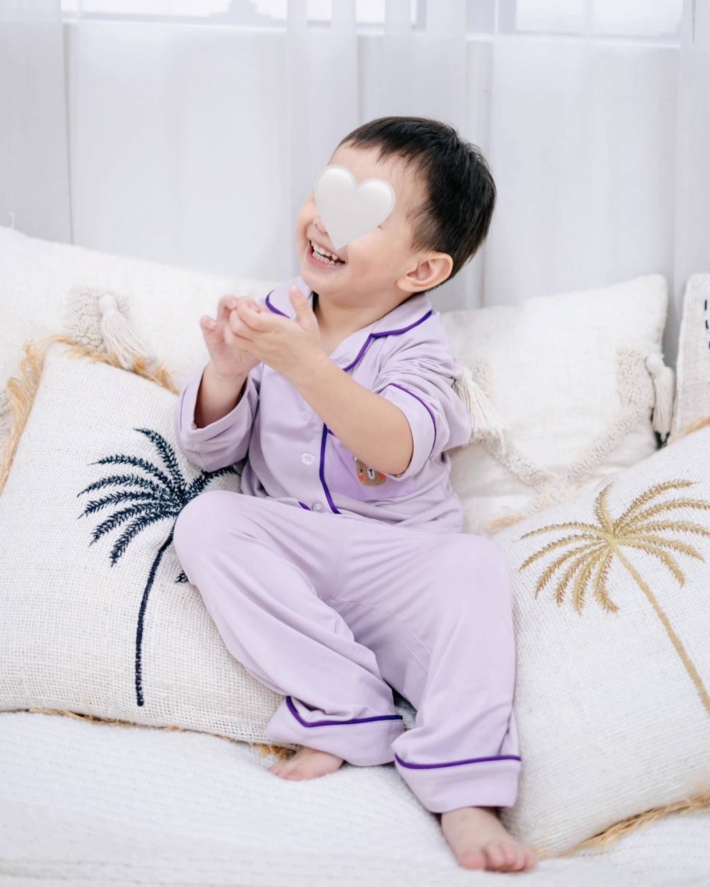 Close up of LeBear × Em Obsessed OEKO-TEX® bamboo lavender pyjamas showing soft fabric and bear embroidery