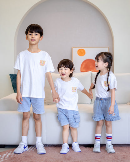 Three kids in matching LeBear Fluffy Embroidery Kids Tee and denim bottoms – sibling and family matching outfit collection by LeBear Singapore.