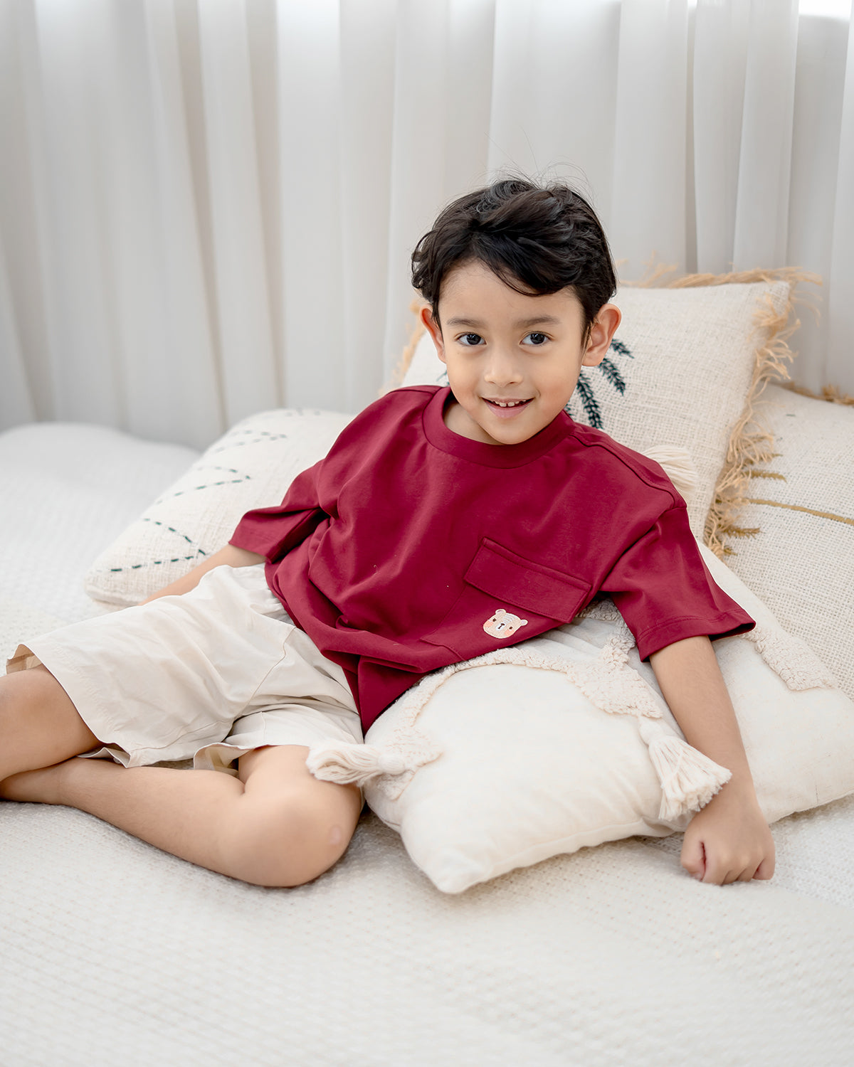 Kids oversized red tee with signature bear embroidery – premium cotton festive wear