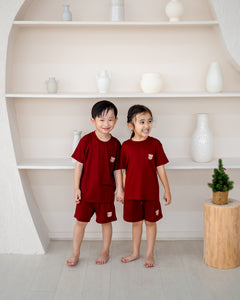 Kids wearing matching LeBear TENCEL™ Lounge Sets in Ruby