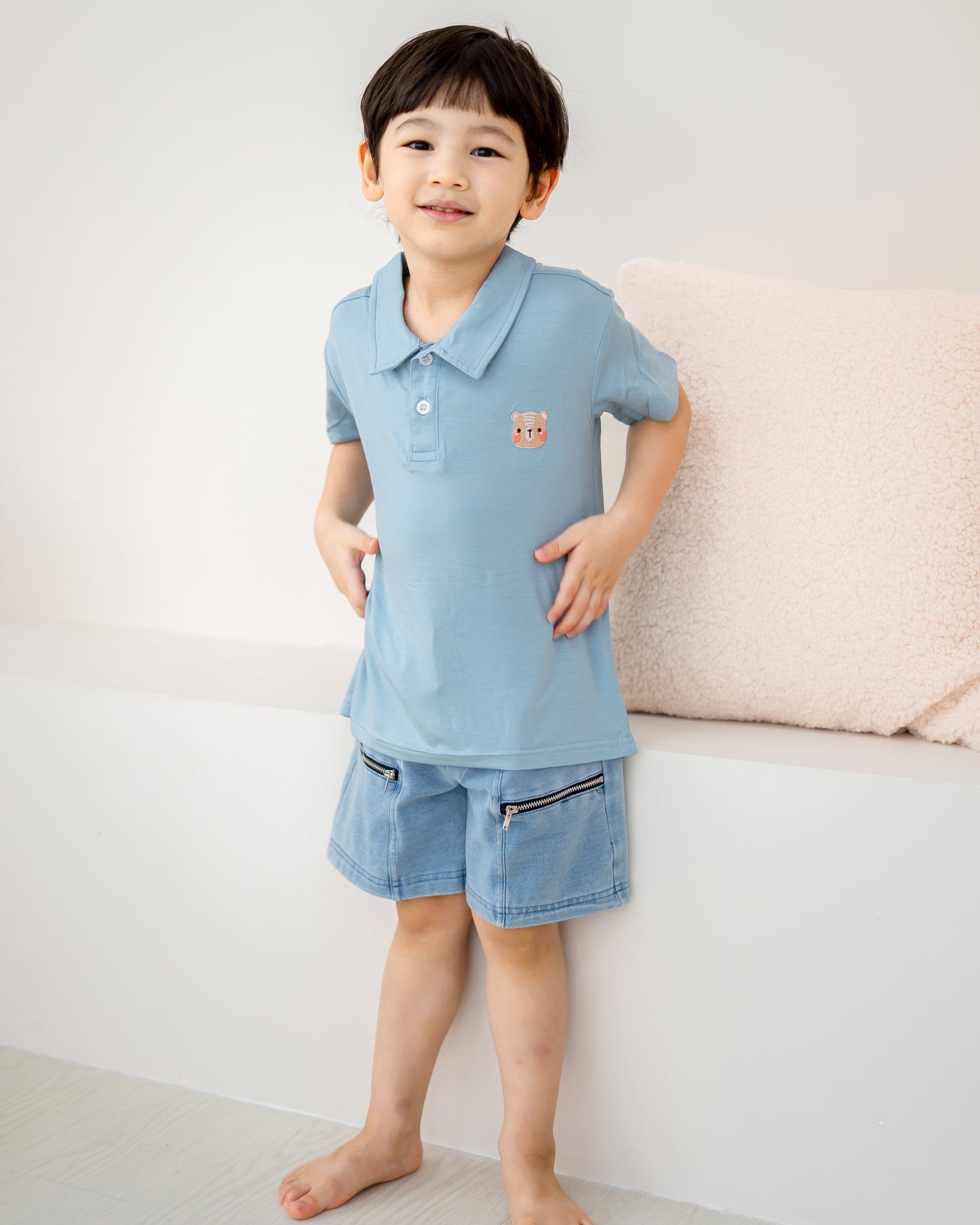 LeBear kids TENCEL™ polo shirt light blue relaxed fit boy leaning soft breathable comfortable kids outfit Singapore