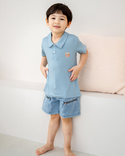 LeBear kids TENCEL™ polo shirt light blue relaxed fit boy leaning soft breathable comfortable kids outfit Singapore