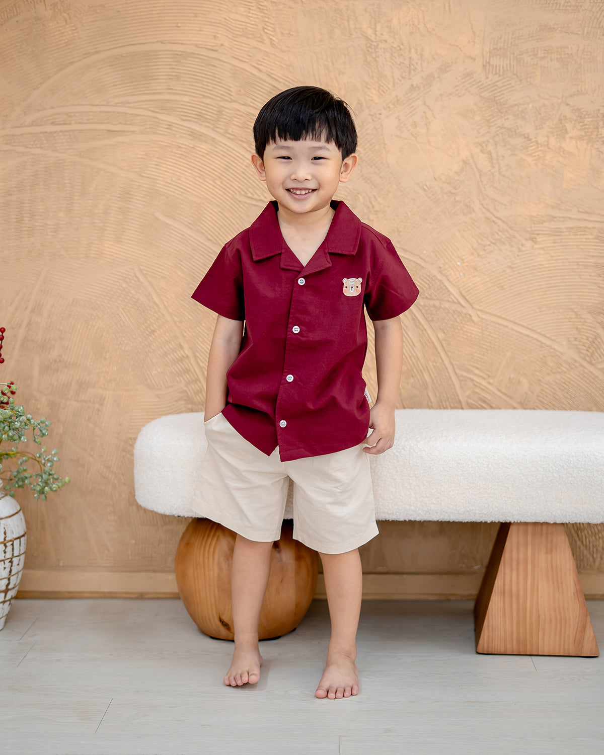 “Boy wearing LeBear Maison Camp Collar Shirt in Berry Rouge – premium cotton boys shirt Singapore”