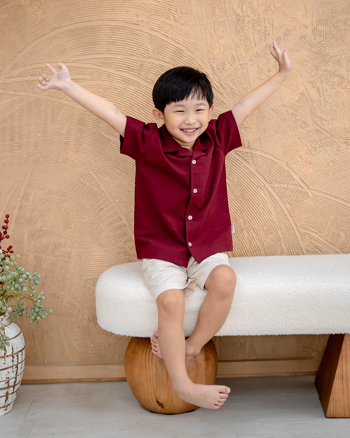 “Full body view of child wearing LeBear Maison Camp Collar Shirt and shorts”