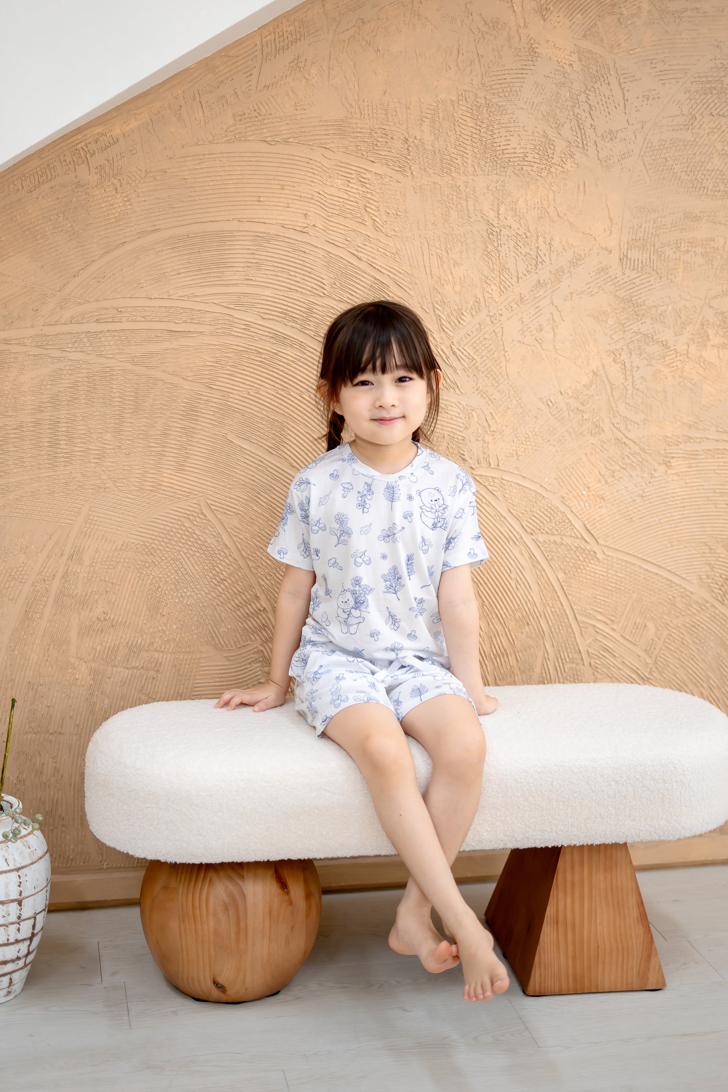 Close-up of LeBear Meadow Blue TENCEL kids top showing soft fabric and print