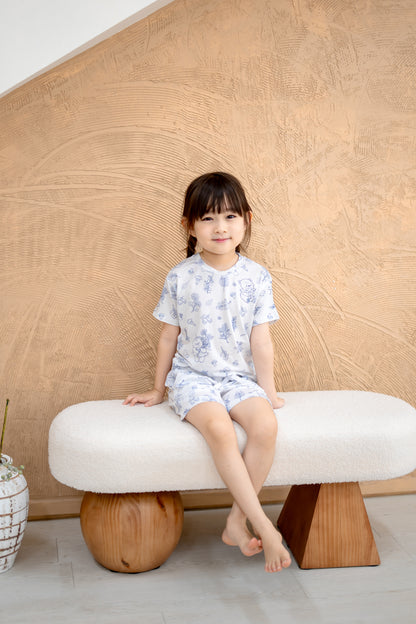 Close-up of LeBear Meadow Blue TENCEL kids top showing soft fabric and print
