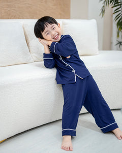 Soft navy bamboo kids pyjamas by Lebear, made with OEKO-TEX certified fabric for comfort
