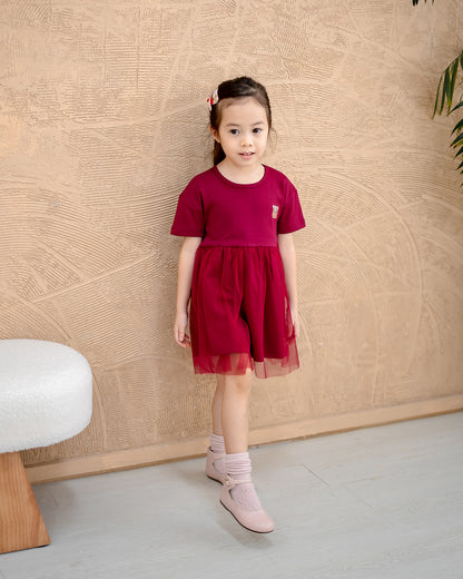 “Lifestyle photo of girl wearing LeBear Roselle Tulle Dress – CNY kids outfit”