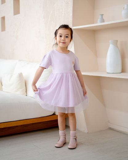 “Girl twirling in LeBear Roselle Tulle Dress – lightweight lilac tulle skirt”