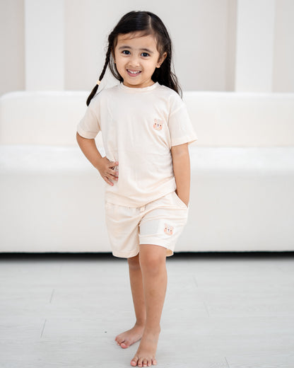 LeBear TENCEL™ kids lounge set cream lifestyle girl soft breathable comfortable kids sleepwear neutral pastel outfit Singapore