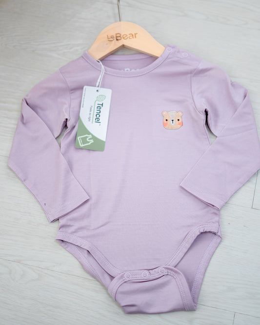 Flat-lay of LEBEAR TENCEL™ Long Sleeve Onesie in Lilac — soft eco-friendly baby bodysuit Singapore.